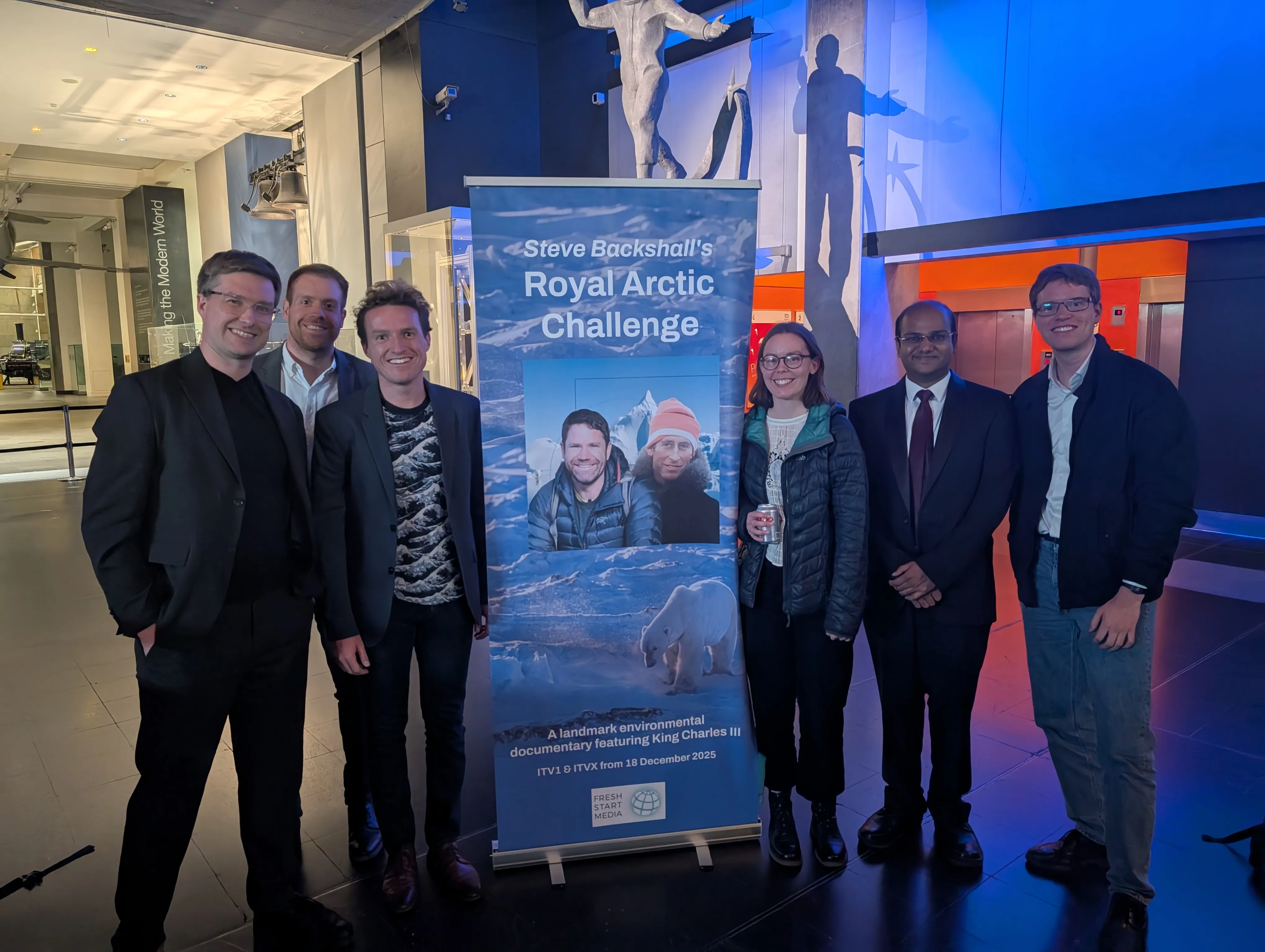 A group photo of IceNet team members attending the premiere
